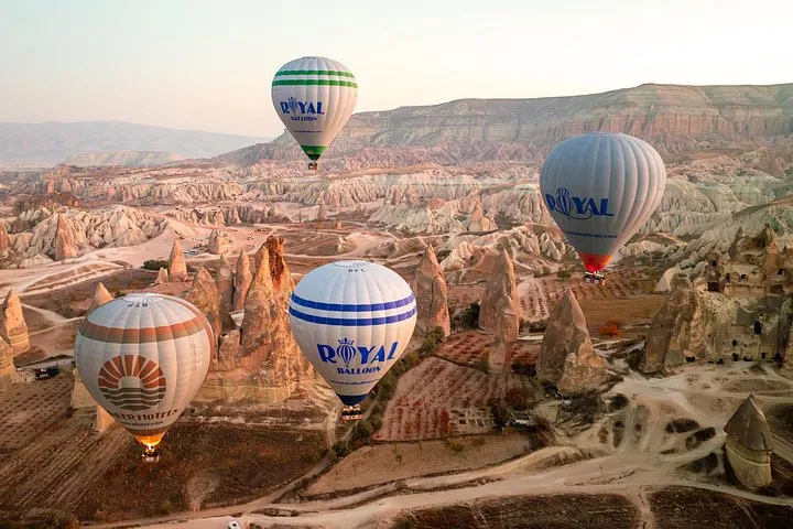 Royal Balloon envelope inflating before sunrise over Cappadocia on a hot air balloon ride